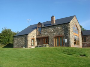 Dormer stone faced house, Millockstown