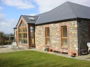 Dormer stone faced house, Millockstown